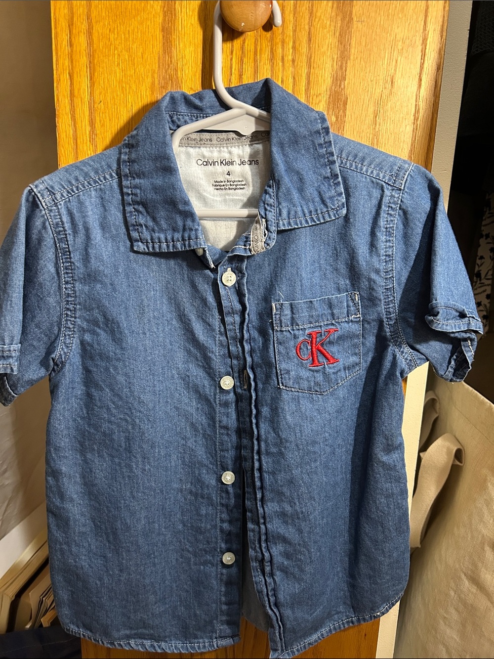 Calvin Klein Jeans Blue Denim Short-Sleeve Button-Up Shirt with Red CK Logo